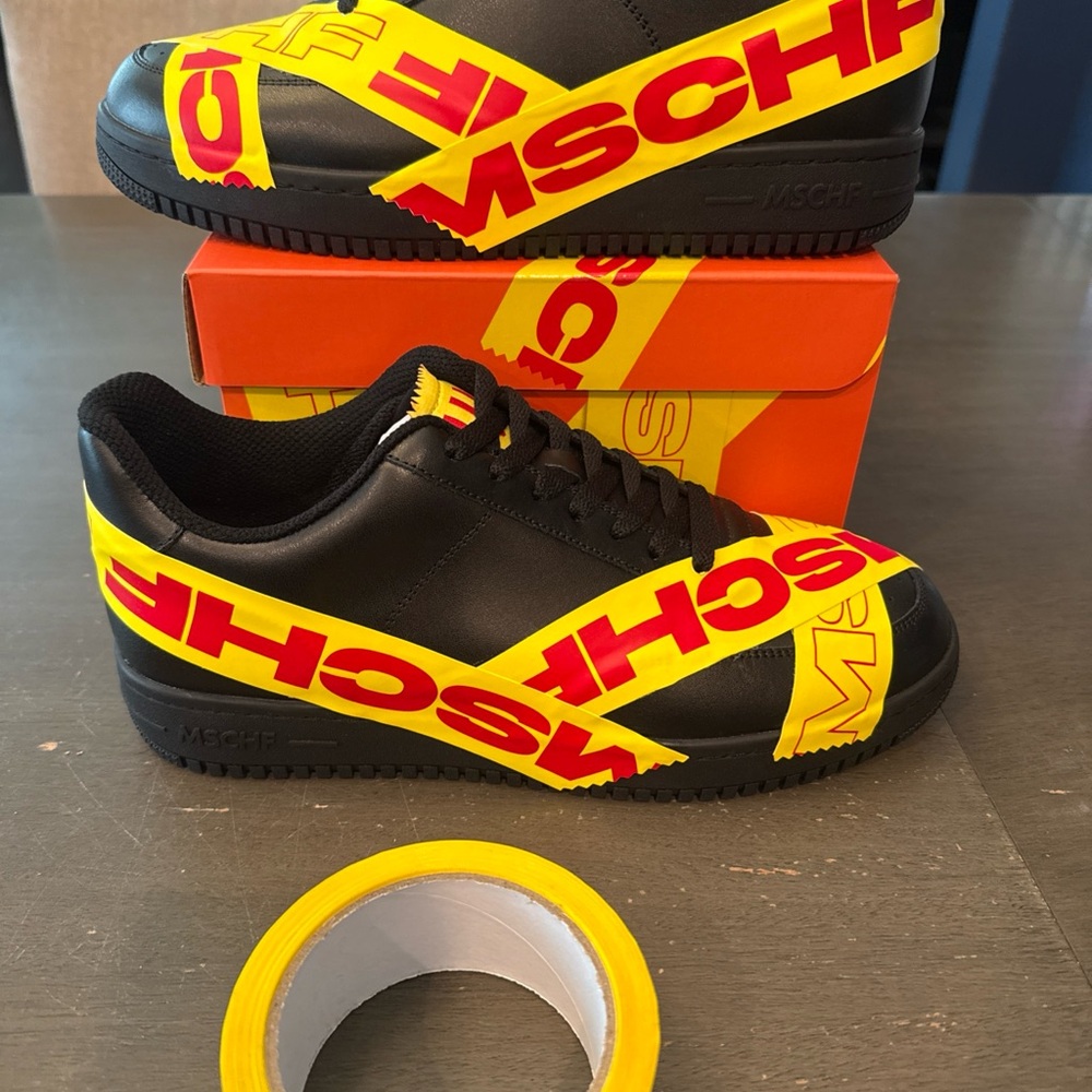 MSCHF Men's Black Athletic Sneakers with Yellow & Red Graphic Tape